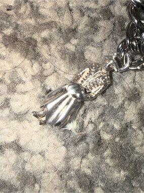 Silver-tone bull fighter charm